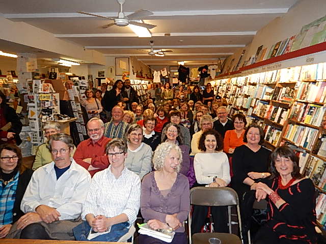 Author's-eye view of Broadside Bookshop launch of 'This Is Paradise.' Stonecoaster scan starts with Lisa Taylor in front row and former faculty member Leslea Newman in second row.